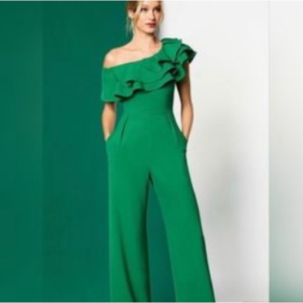 Green one shoulder flare romper with pockets!